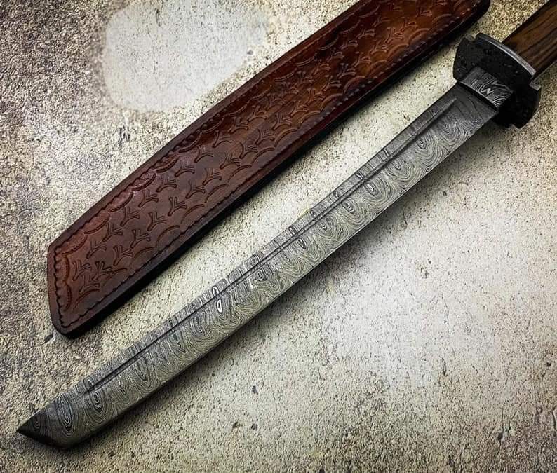 Custom handmade damascus steel katana with leather sheath!