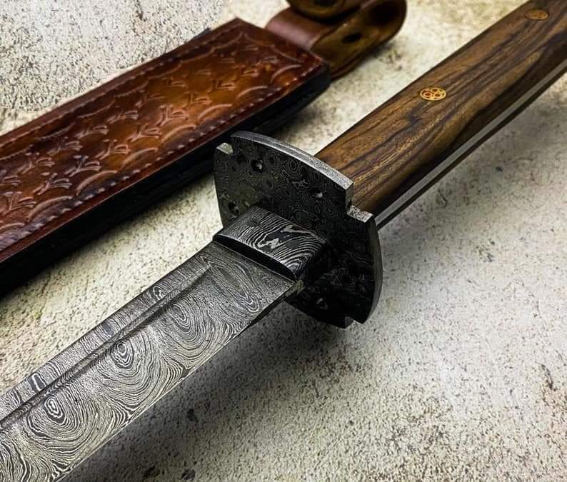 Custom handmade damascus steel katana with leather sheath!
