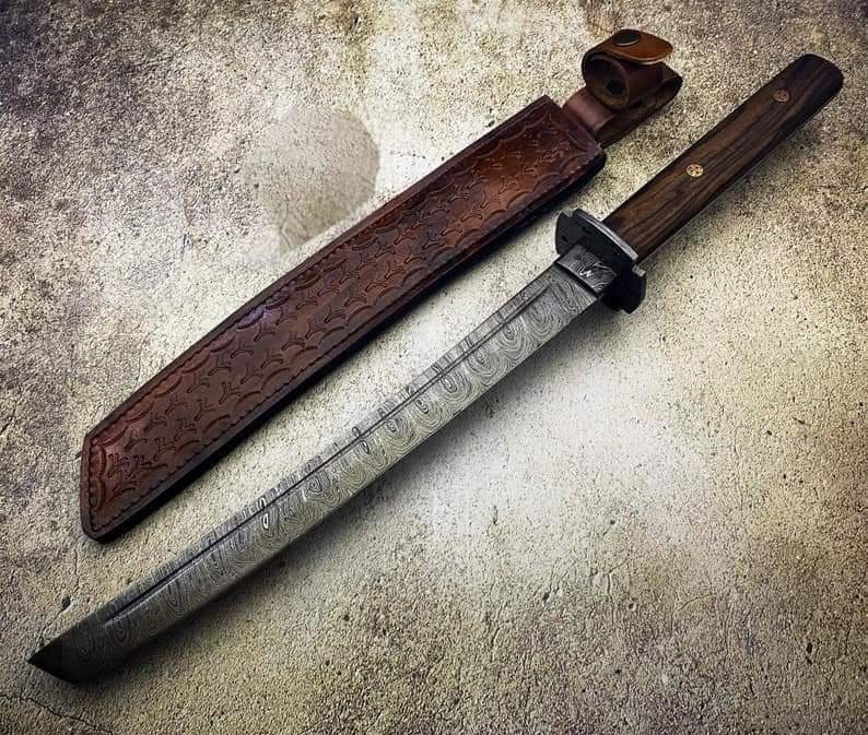 Custom handmade damascus steel katana with leather sheath!
