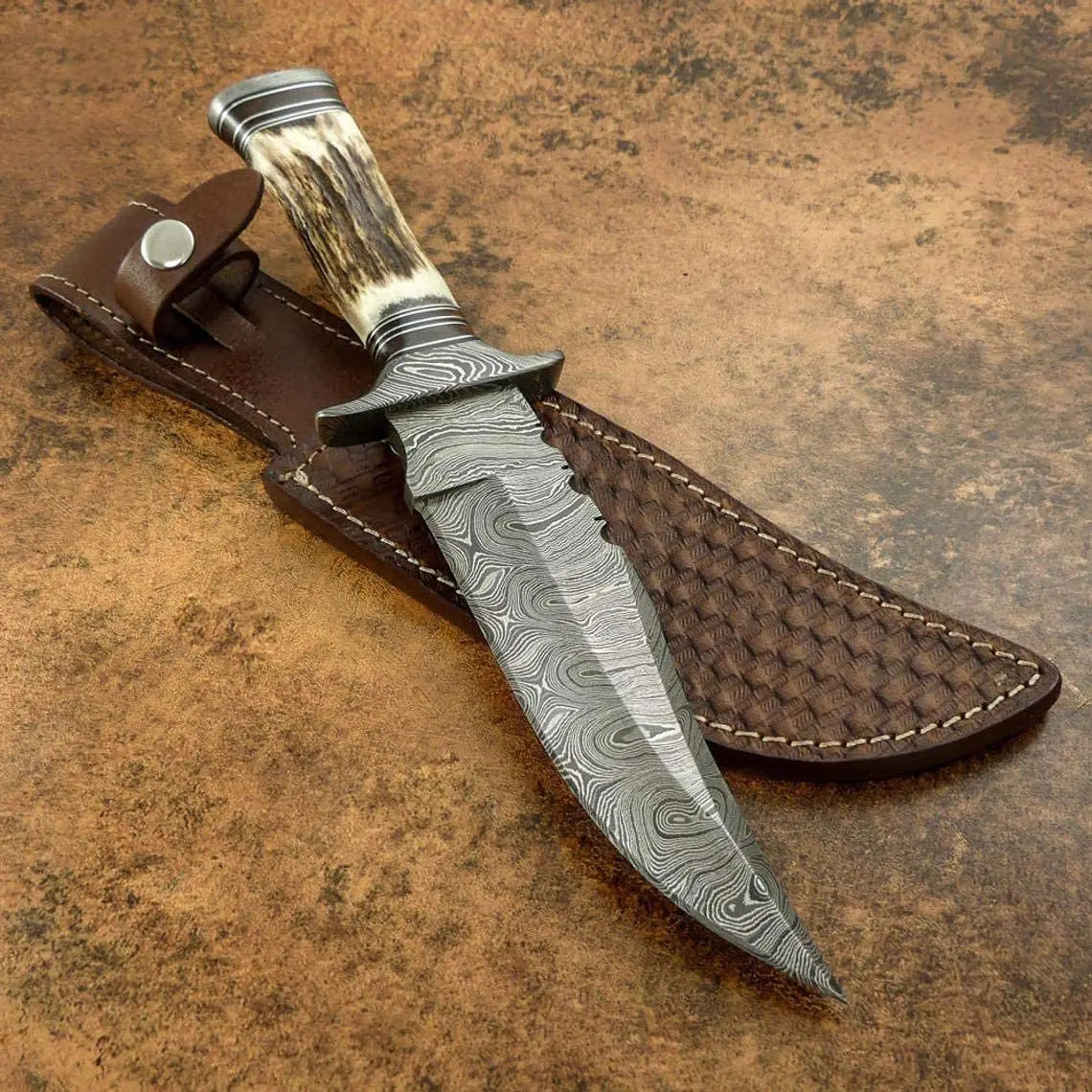 Custom handmade Damascus steel hunting Bowie with leather sheath - Image #1