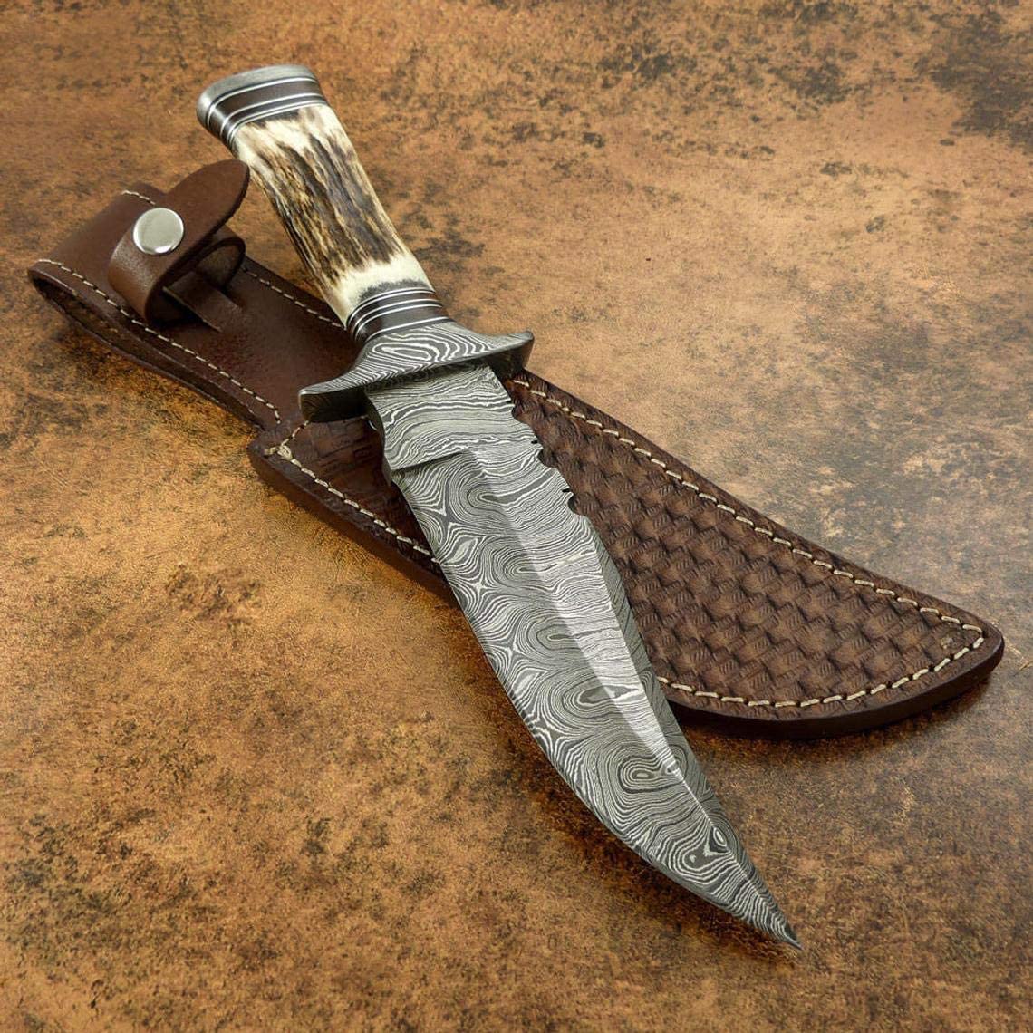 Custom handmade Damascus steel hunting Bowie with leather sheath