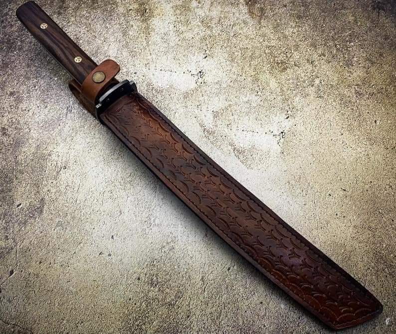 Custom handmade damascus steel katana with leather sheath!
