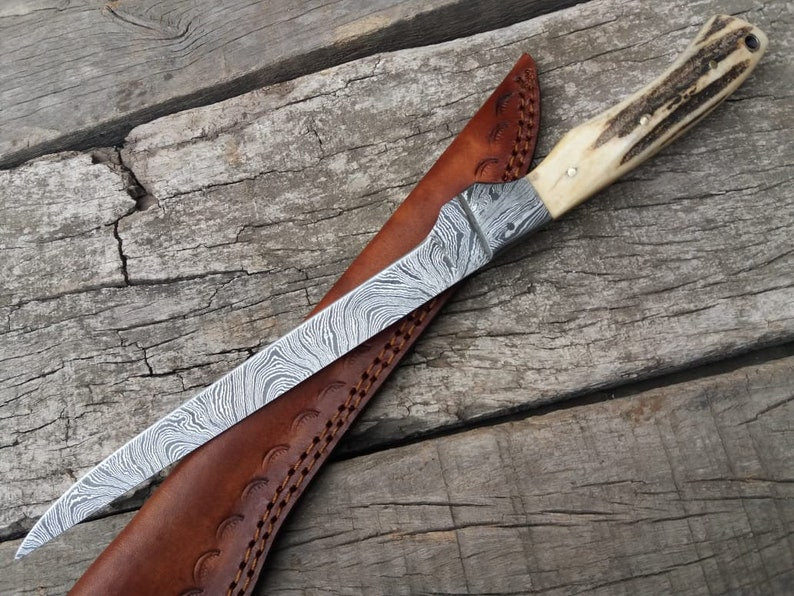 Custom handmade damascus steel fish fillet knife with leather sheath/stag horn handle