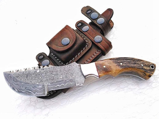 Custom handmade damascus steel Tracker knife with leather sheath/rain drop pattern